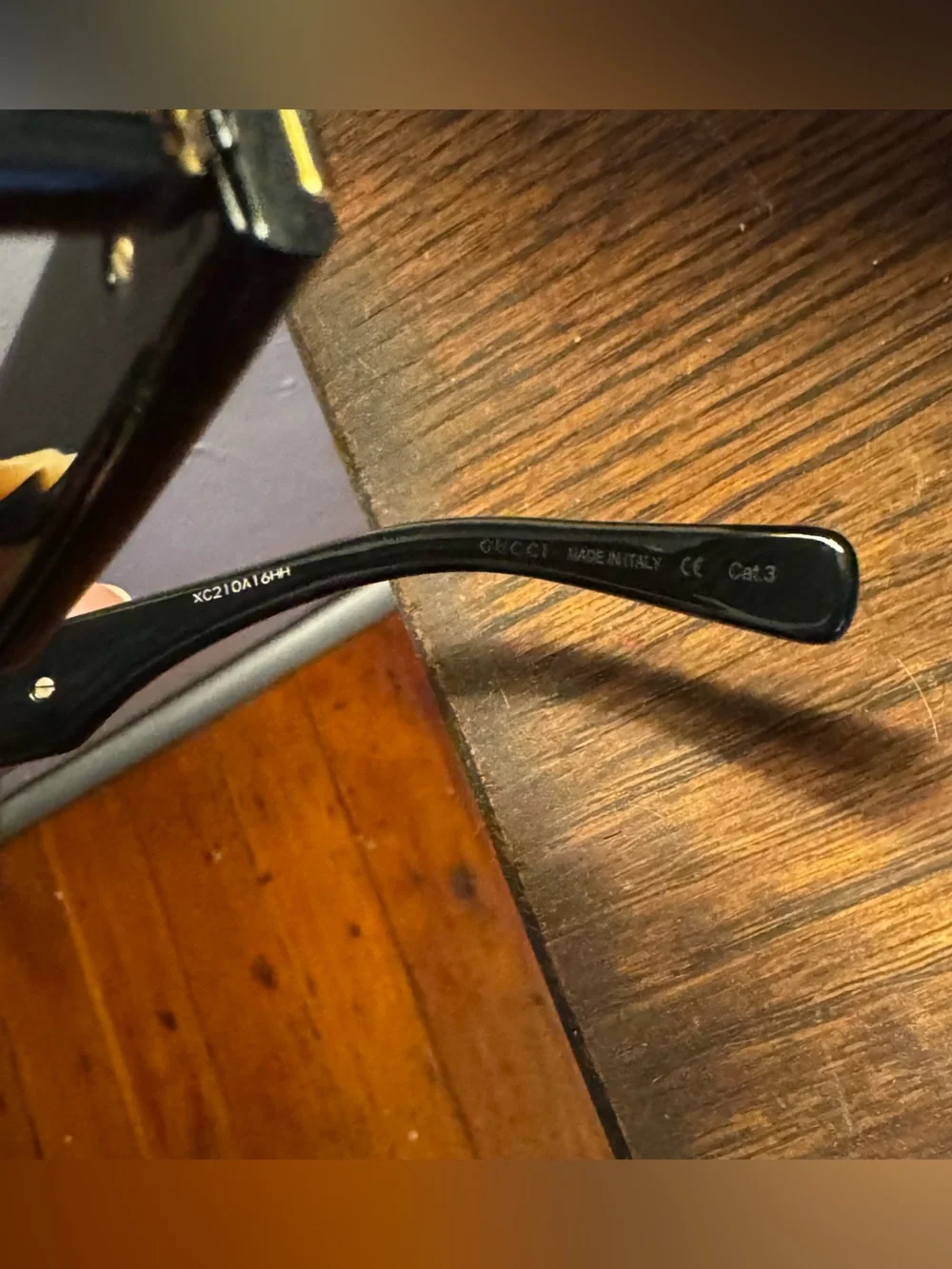 Gucci oversized black and gold sunglasses